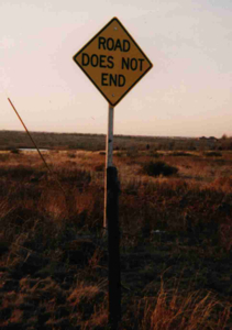 [signage: ROAD DOES NOT END]